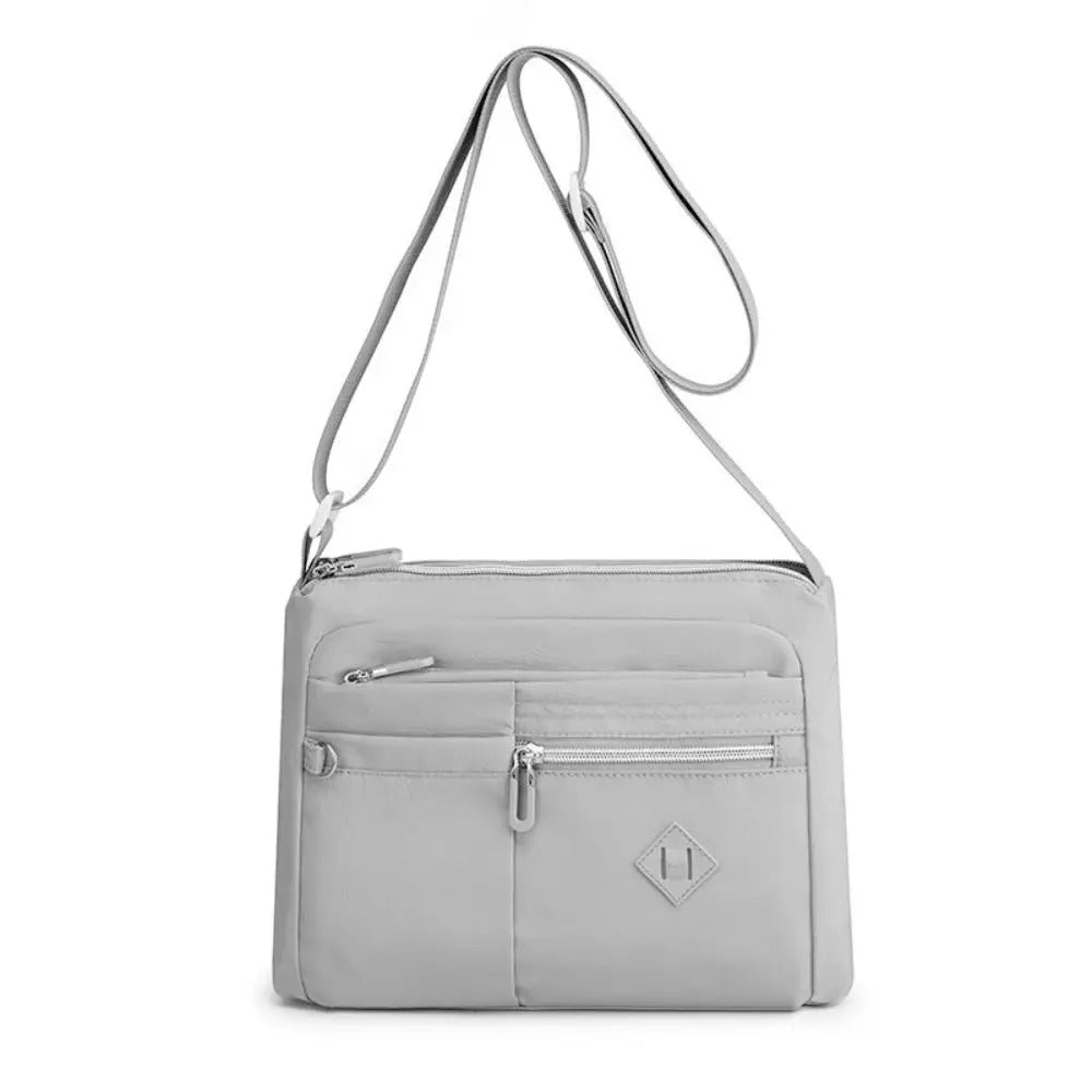 Eleganza™ - Cartera de mano multifuncional