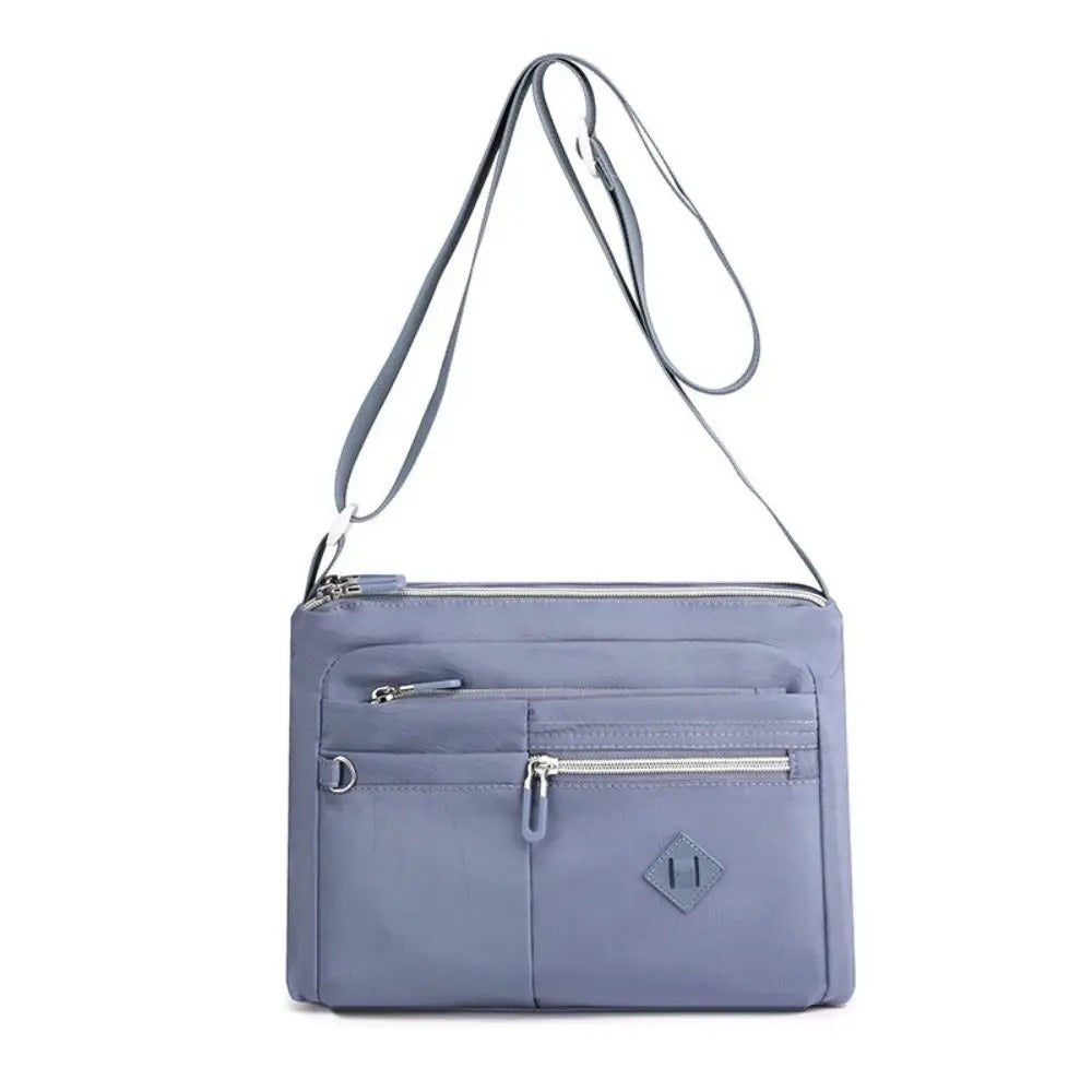 Eleganza™ - Cartera de mano multifuncional