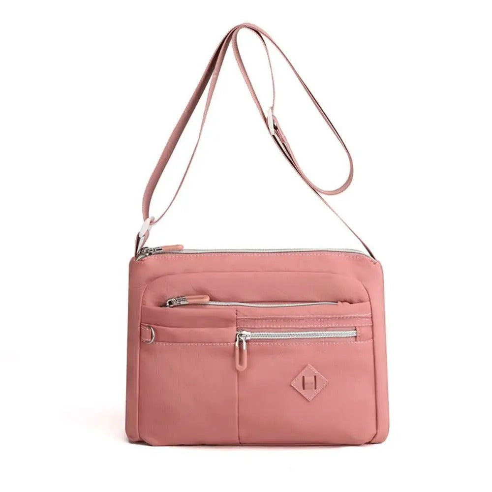 Eleganza™ - Cartera de mano multifuncional